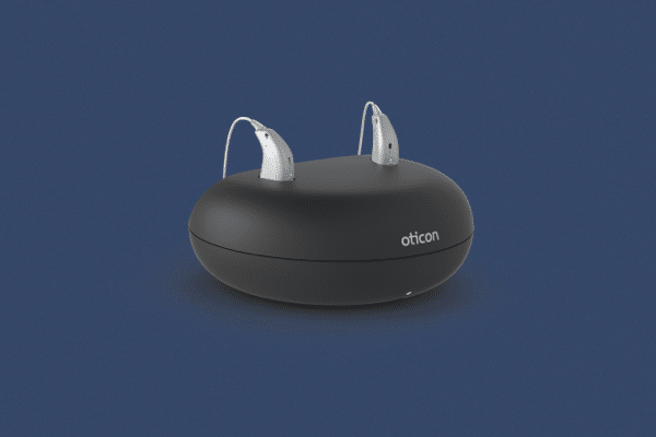 Hearing aids in a charging cradle
