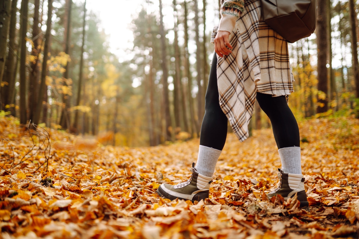 Person takes fall hike in autumn